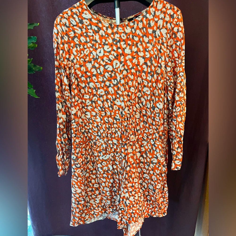 Lightweight, long sleeve romper.